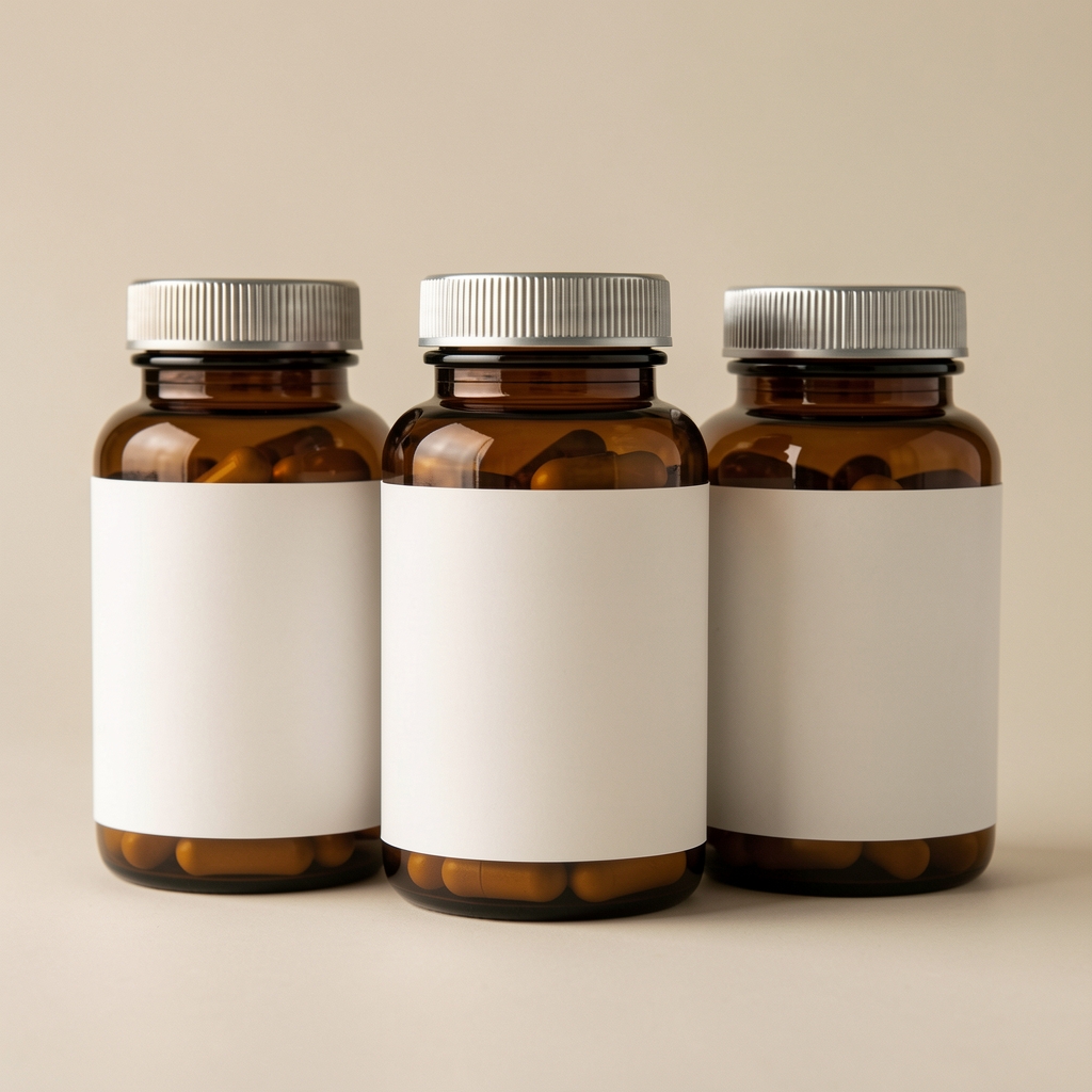 Set of three supplement bottles arranged together on neutral background, editorial arrangement with soft natural light